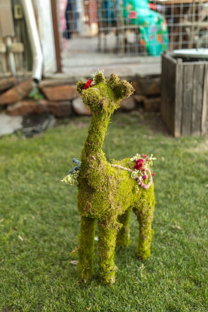Giraffe wedding topiary.