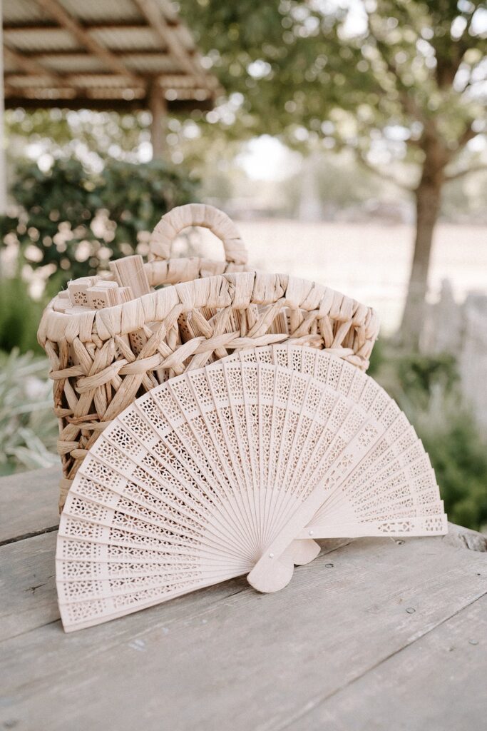 Fan for guests at wedding ceremony.