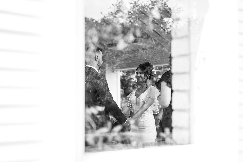 A black and white photo of a bride and groom.