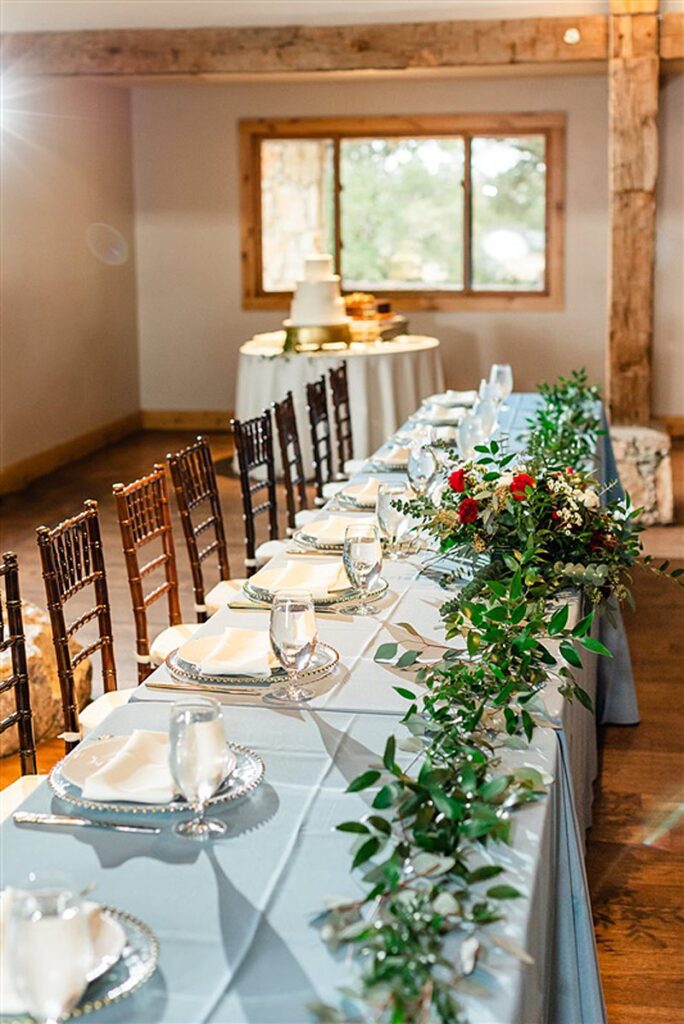 Camp Lucy Wedding: A beautifully decorated table set up for a wedding reception at Camp Lucy.