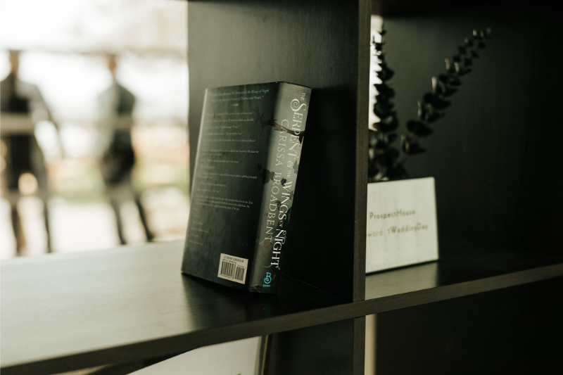 A bookshelf display for wedding decor. 