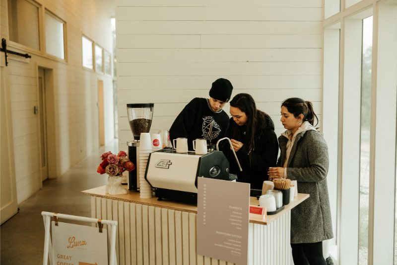 Baristas work to make lattes during wedding at Prospect House.