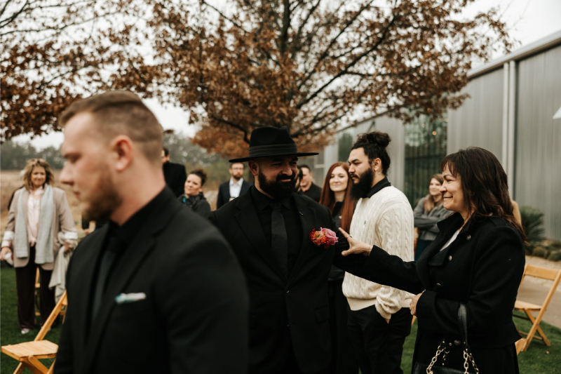 Groom walks down spiral aisle for wedding ceremony. 