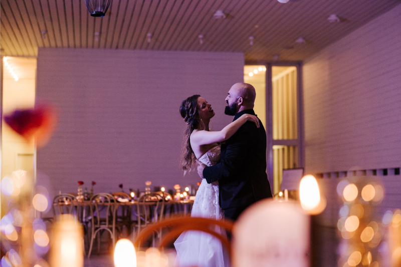 A bride and groom share final dance of the night. 