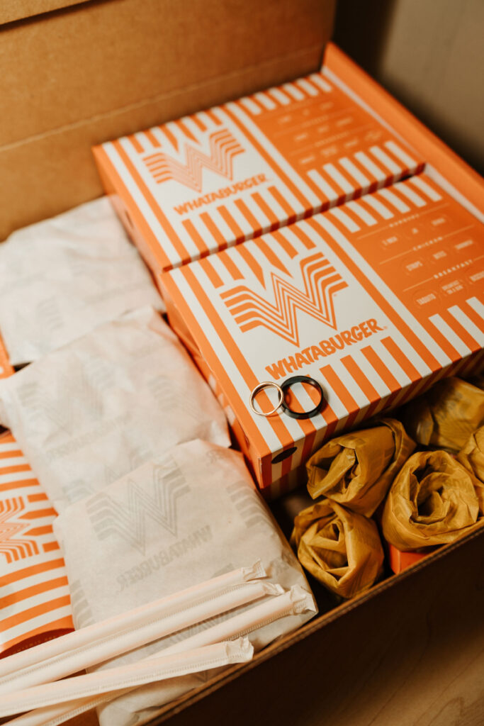 Whataburger box with newlyweds rings.