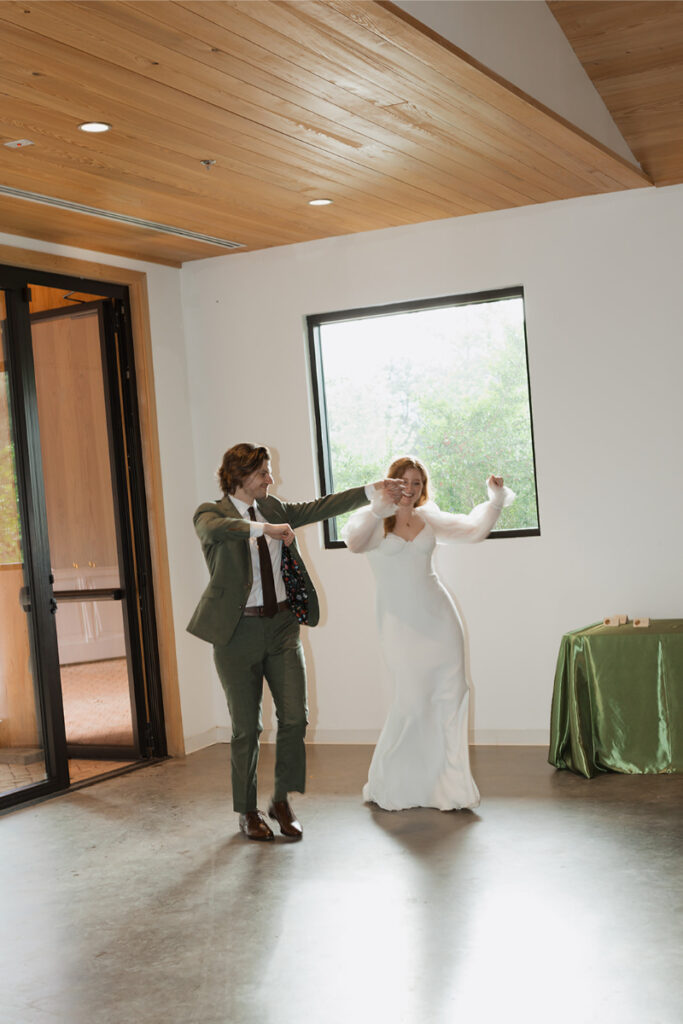 Bride and groom enter reception hall at The Grand Lady Austin.