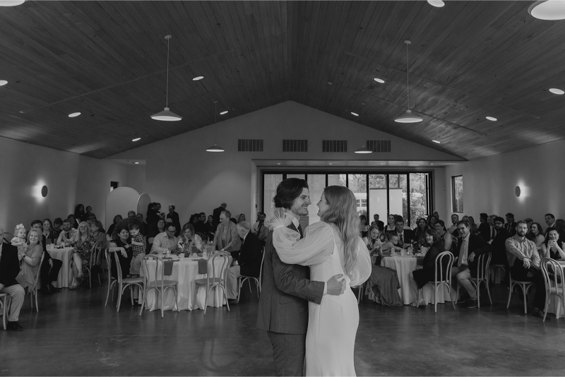 Bride and groom share first dance in the reception hall at The Grand Lady Austin.