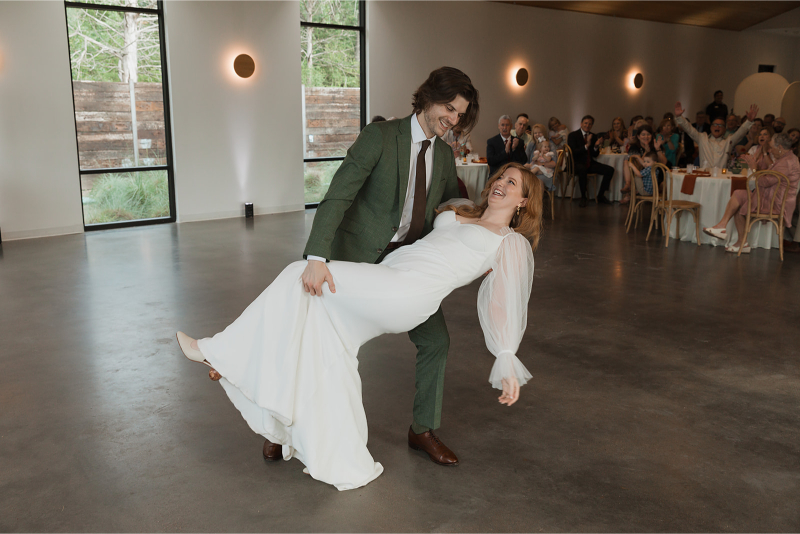 Bride and groom share first dance in the reception hall at The Grand Lady Austin.