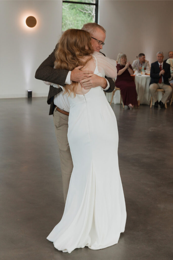 Bride shares dance with father in the reception hall at The Grand Lady Austin.