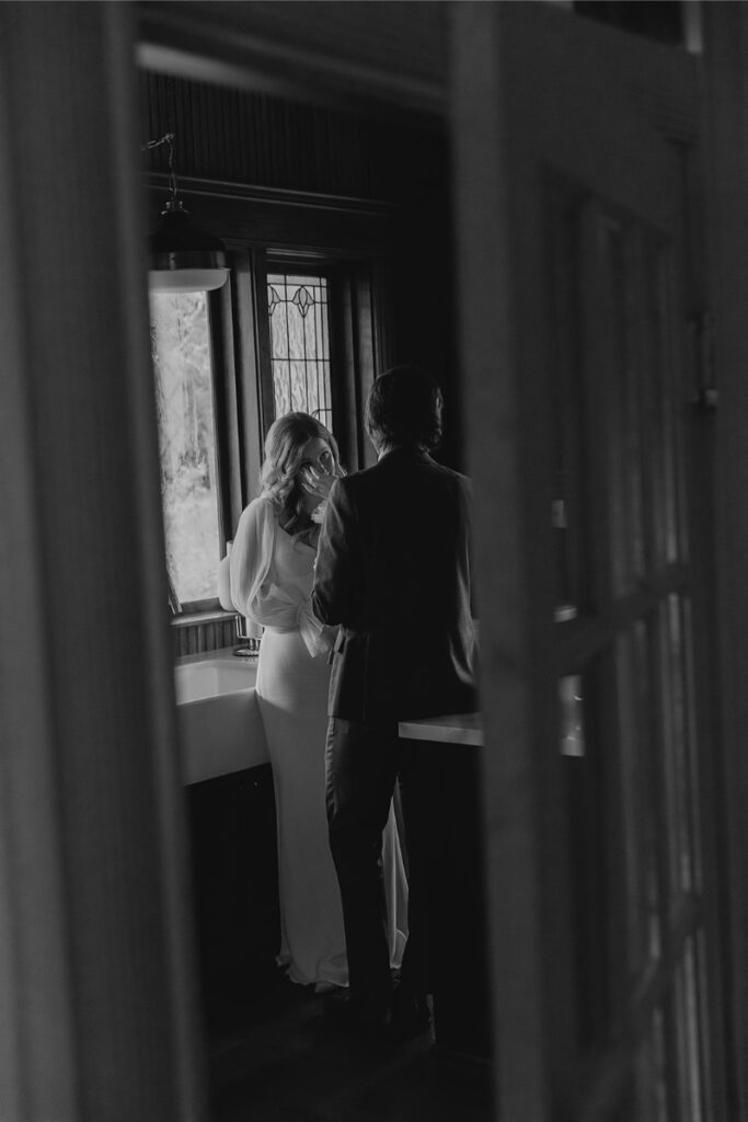 Bride and groom share private vows in the kitchen of The Grand Lady Austin. 