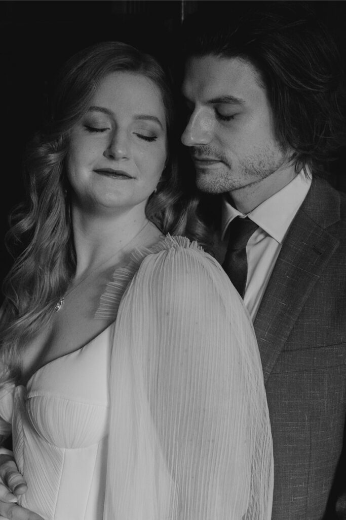 Bride and groom take portraits in the mansion of The Grand Lady Austin. 