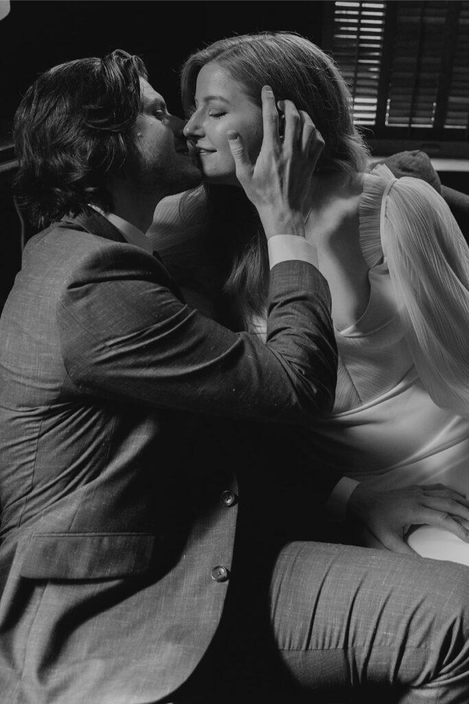 Bride and groom take portraits in the mansion of The Grand Lady Austin. 