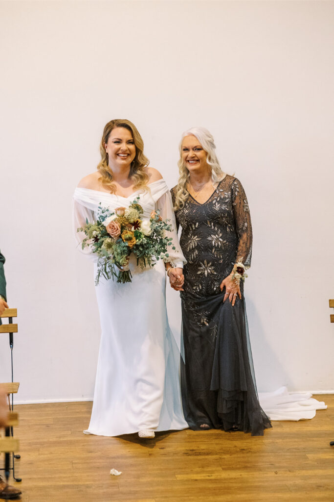 Bride is rewriting modern wedding traditions by having her mother walk her down the aisle.
