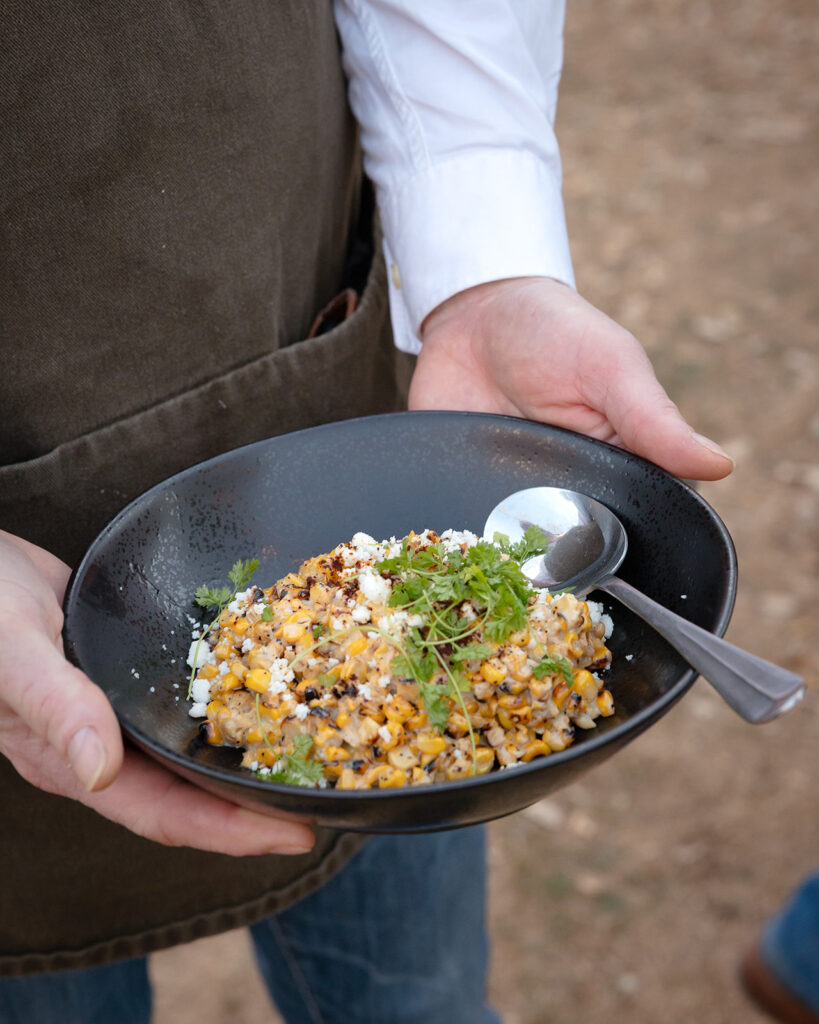 Contigo chef serving guests.